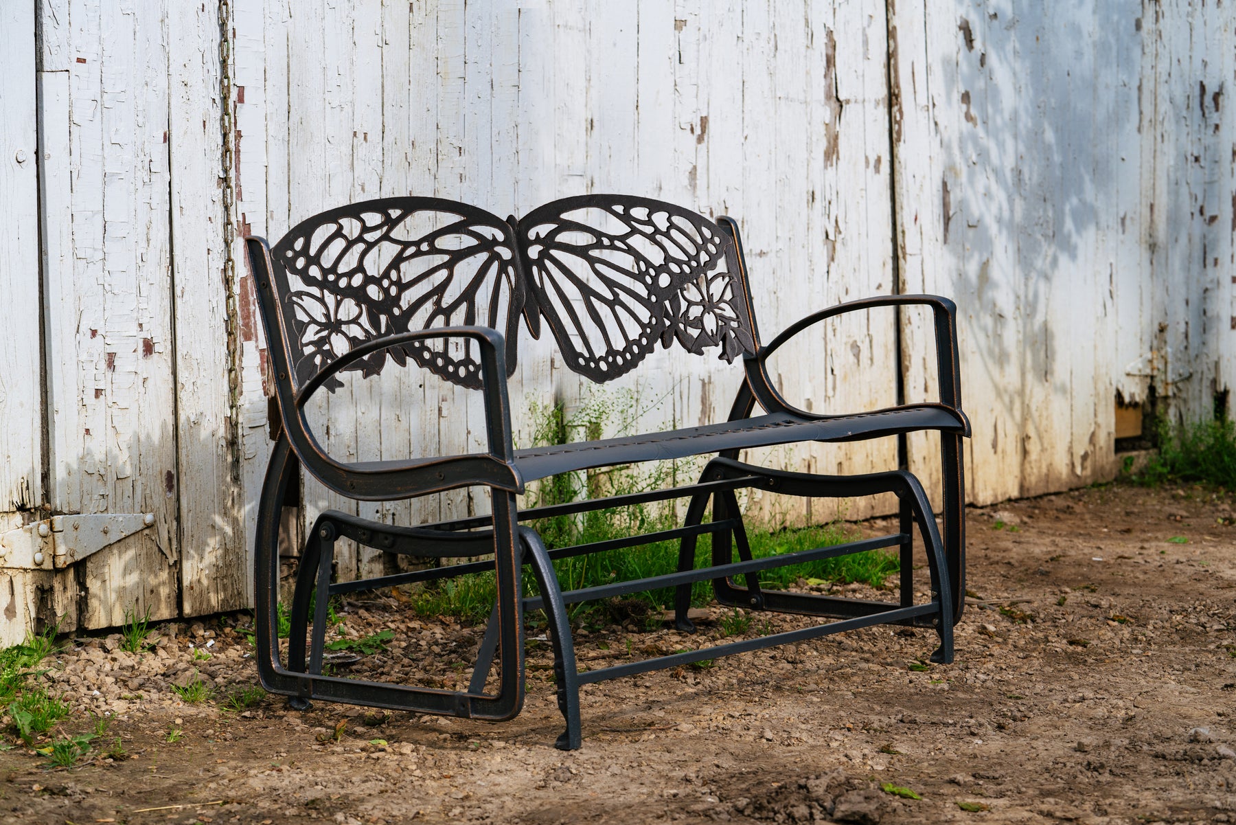 Cast Iron Butterfly Glider Bench designed by Painted Sky Designs